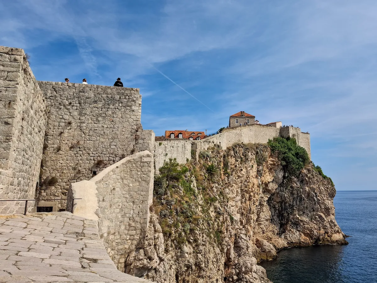 View from Bokar Fortress looking across the city walls standing directly atop the highest seaside cliffs of Dubrovnik