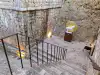 View looking down the stone staircase connecting the terrace of Bokar Fortress with the lower courtyard