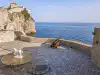 Top terrace of Bokar Fortress overlooking the Adriatic Sea, coastal cliffs, and Dubrovnik City Walls