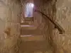 Curved stone passage inside Bokar Fortress leading toward the upper exterior section