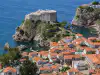 High-angle aerial view of Fort Lovrijenac with Pile Bay and Dubrovnik rooftops visible