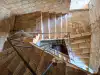 Top-down view of the triangular stone staircase leading to the top terrace of Fort Lovrijenac
