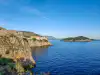 View from the Gradac Park entrance area looking right over the sea toward Lokrum Island and the cliffside walls