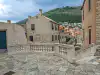 Railing at the top of the Jesuit Staircase overlooking Gundulic Square in Dubrovnik Old Town