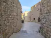 Stone pathway on Margarita Street near the Buža Bar entrance leading toward the St. Margarita Church courtyard area