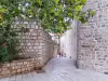 View along Margarita Street from the courtyard near St. Margarita Church toward the street entrance