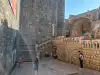 View of the stone stairs in the fortified passage of Pile Gate in Dubrovnik Old Town