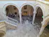 Wide look down from the upper gallery onto the courtyard and the Miho Pracat statue inside the Rector's Palace