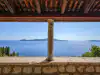 Zoomed view from the gloriette pavilion in Trsteno Arboretum looking out over the sea