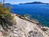 Flat concrete paved rocky beach below Villa Aurora in Trsteno facing Lopud island