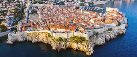 Dubrovnik’s Old Town surrounded by medieval walls and fortresses, featured in the Dubrovnik History Walking Tour